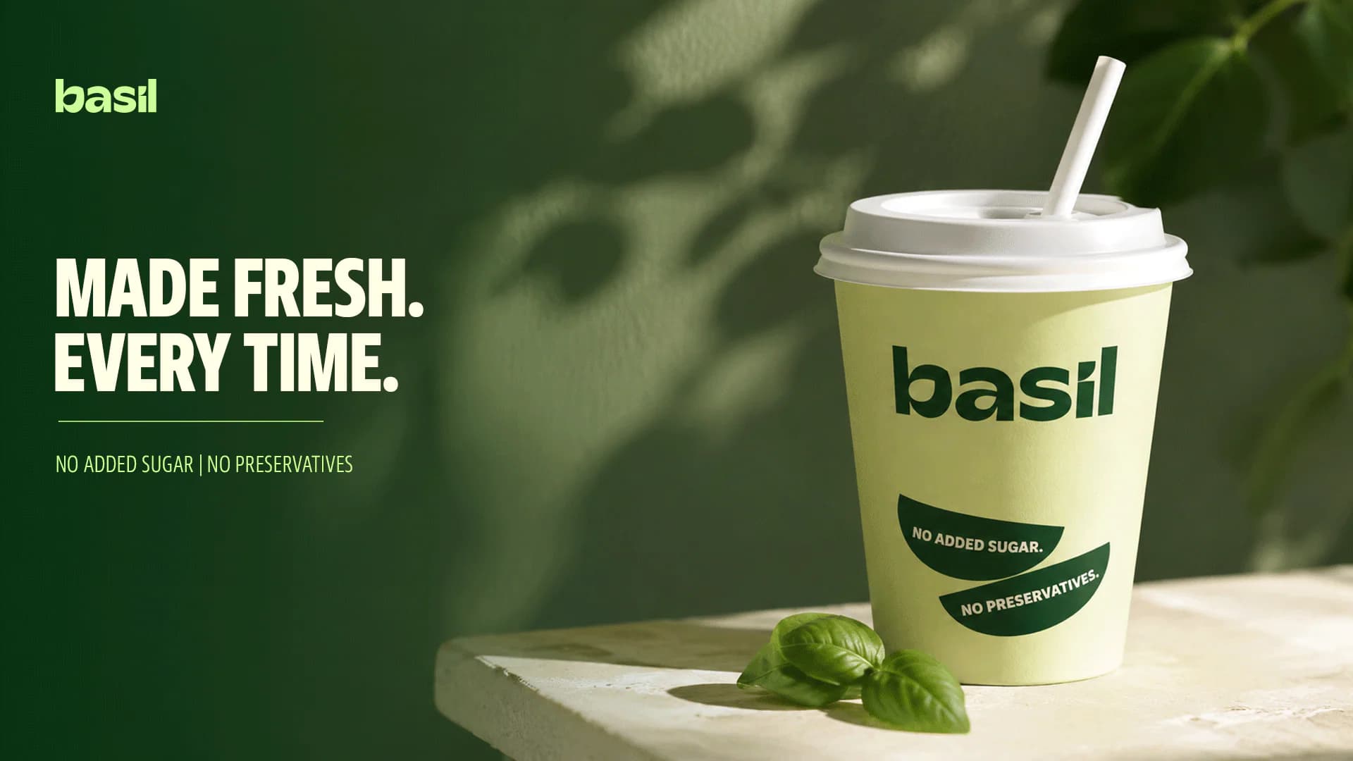 Basil hero: “Made fresh. Every time.” — a Basil cup on a green photographic background