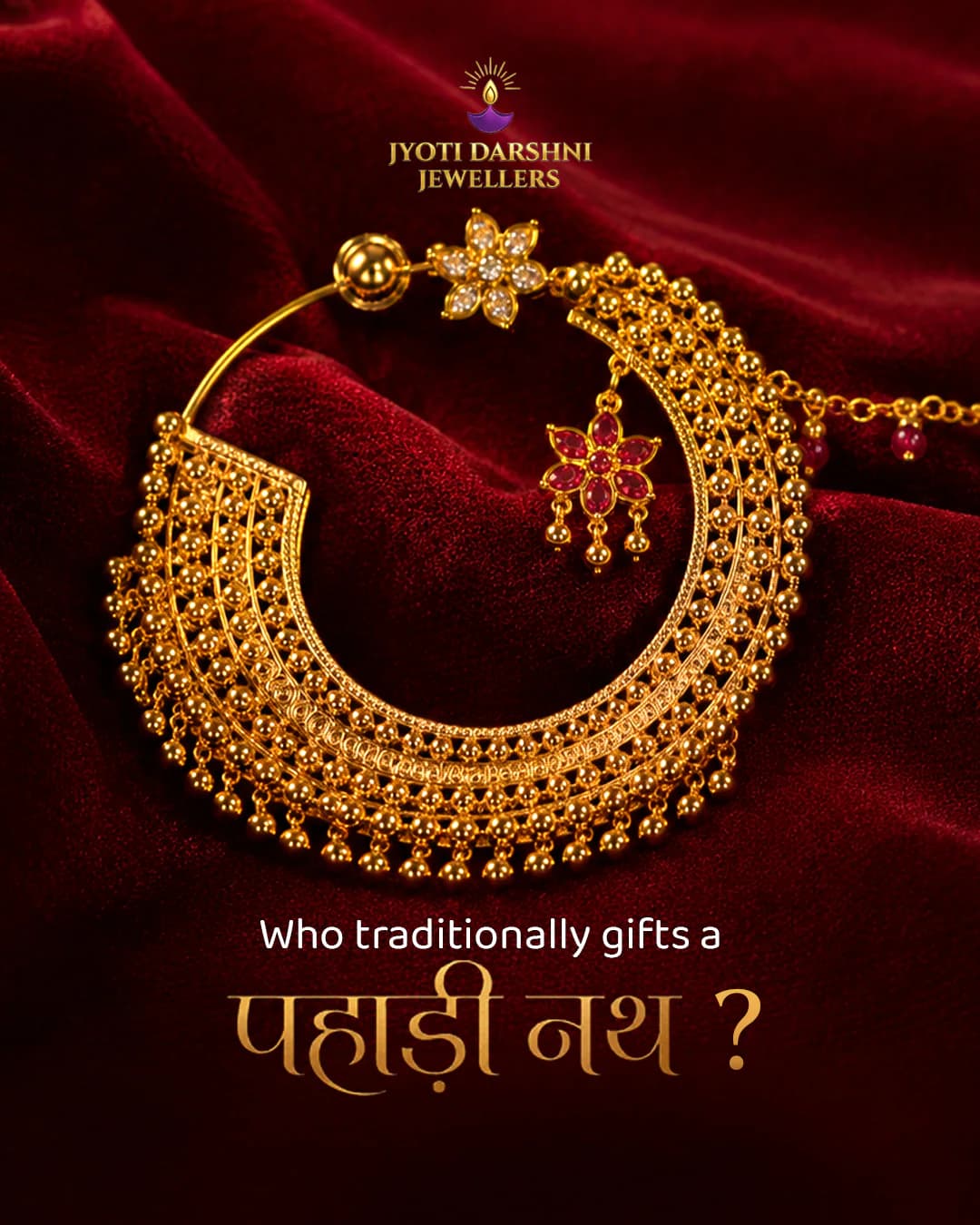 Jyoti Darshni Jewellers: a gold nath on red velvet